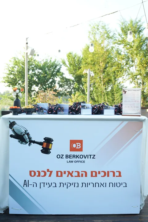 Conference welcome desk with the firm’s branding